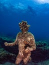 Statue of Dionysus with a crown of ivy in ClaudioÃ¢â¬â¢s Ninfeum. underwater, archeology.